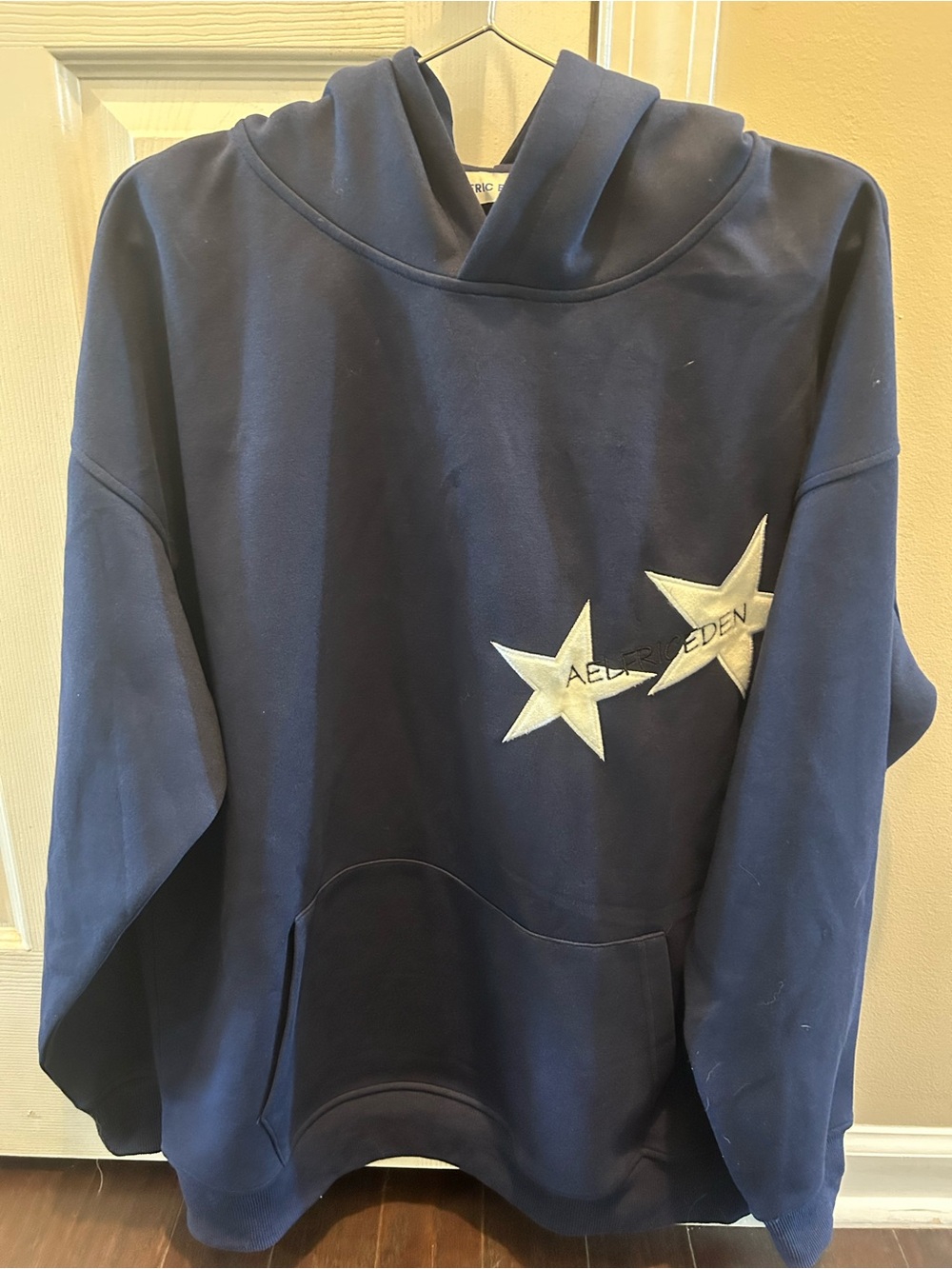 Aelfric Eden Navy Pullover Hoodie with White Logo Tag Fuzzy stars Large Like New